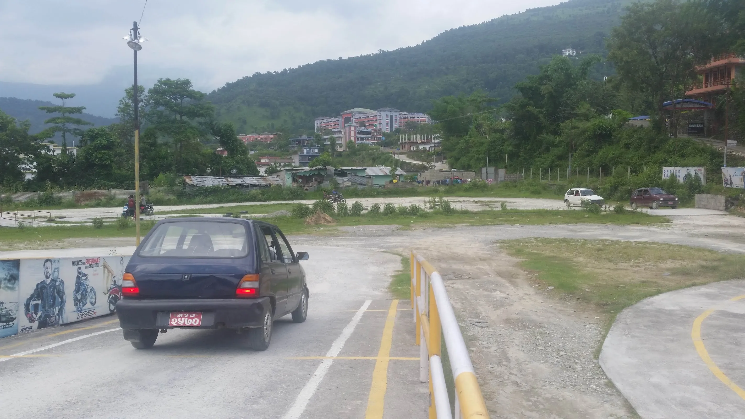 Training car with helmet markings on the wide ground during monsoon season