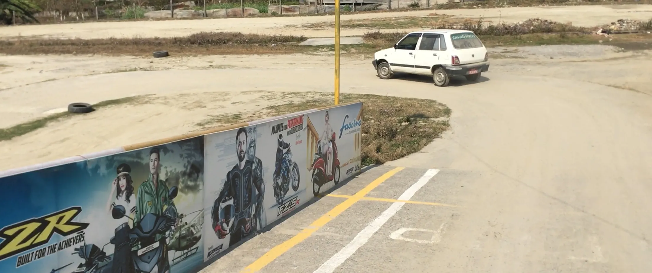 Yellow road-marking lines painted on the practice ground